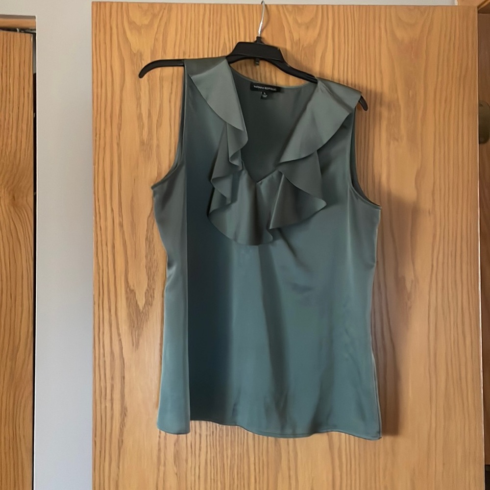 Brand new vneck ruffles top. No tag